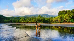 couple walking on Costa Rica beach